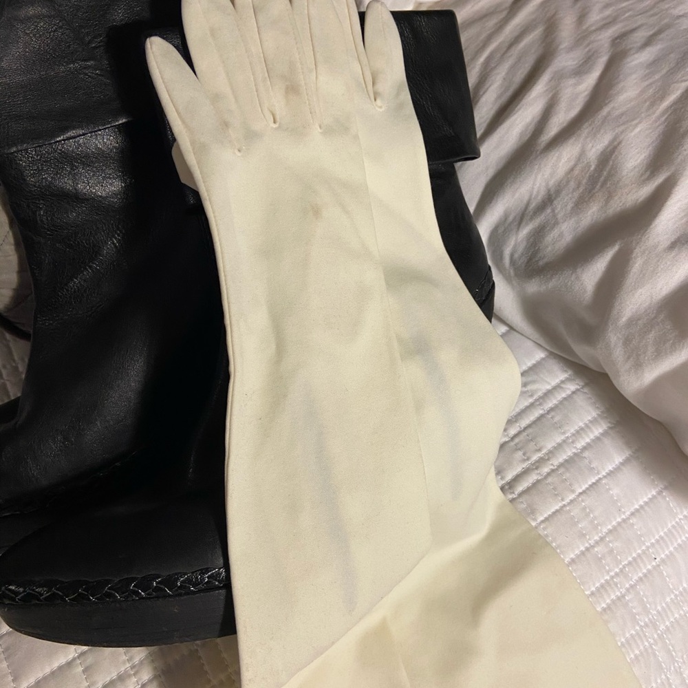 Cream/off white colored elbow length gloves